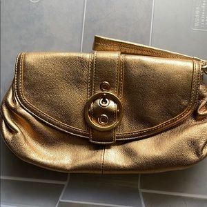 Coach clutch gold color